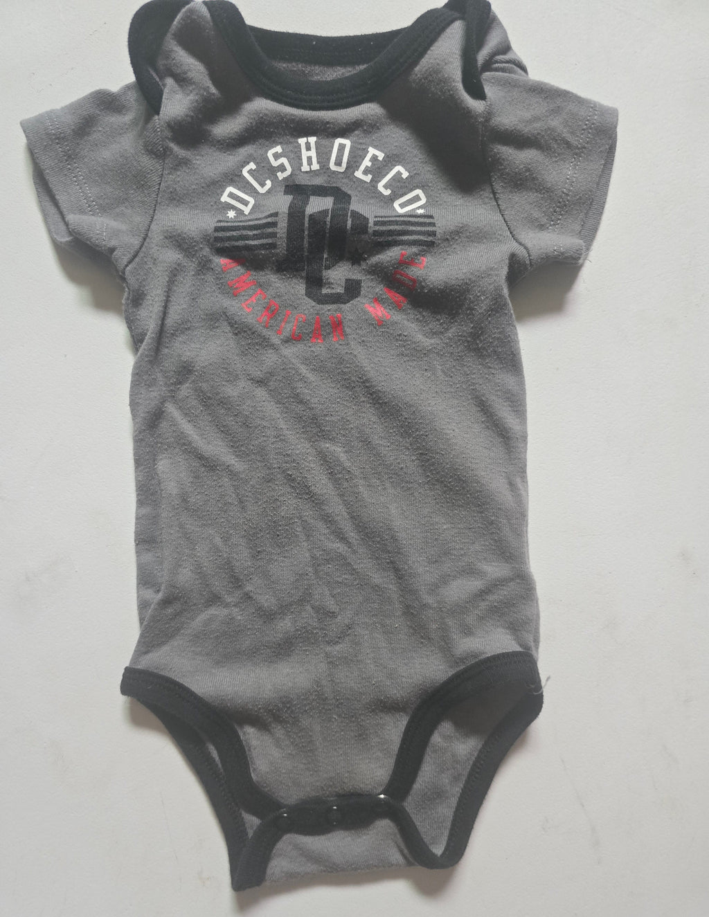 DC Graphic Bodysuit | 6-9M